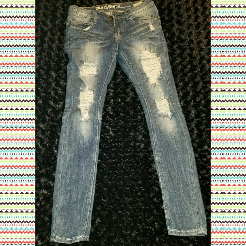 Medium wash shredded design skinny jean